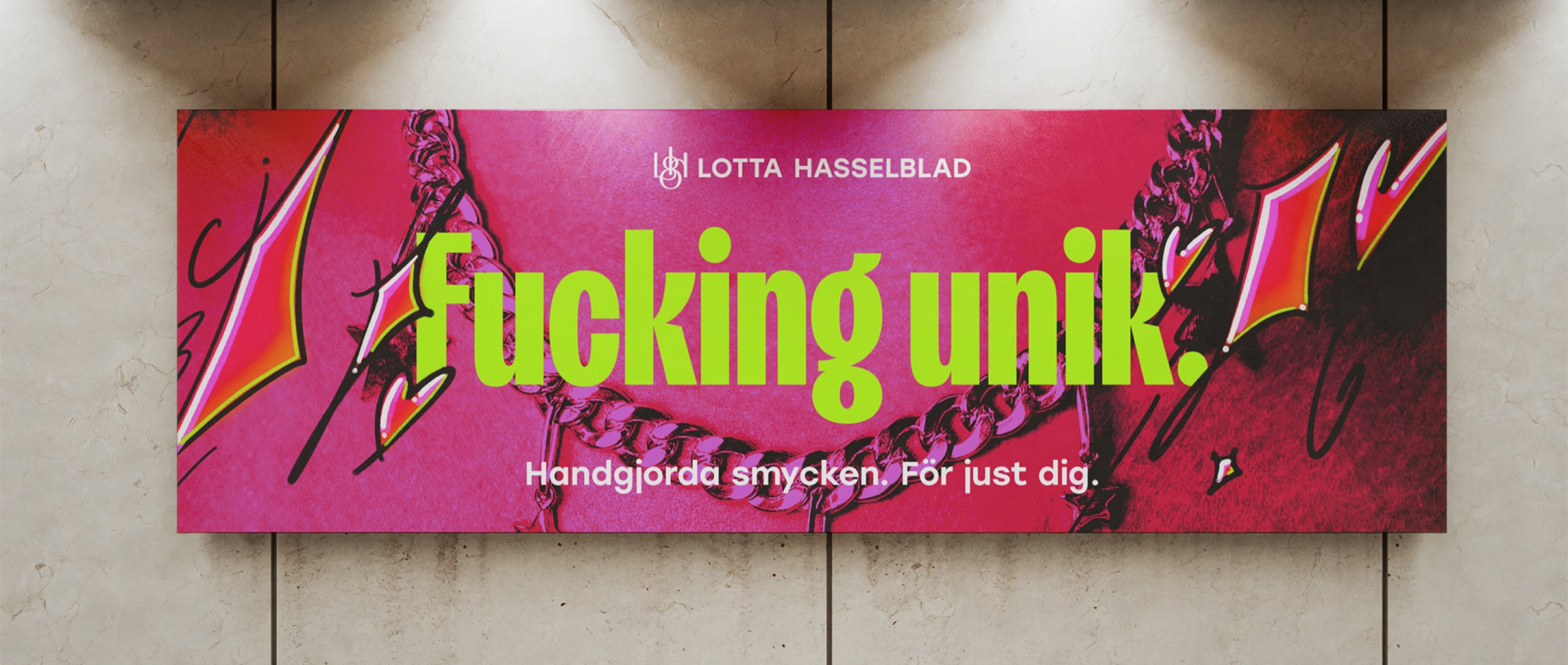 Pink billboard reading “Fucking unik. Handgjorda smycken. För just dig.”