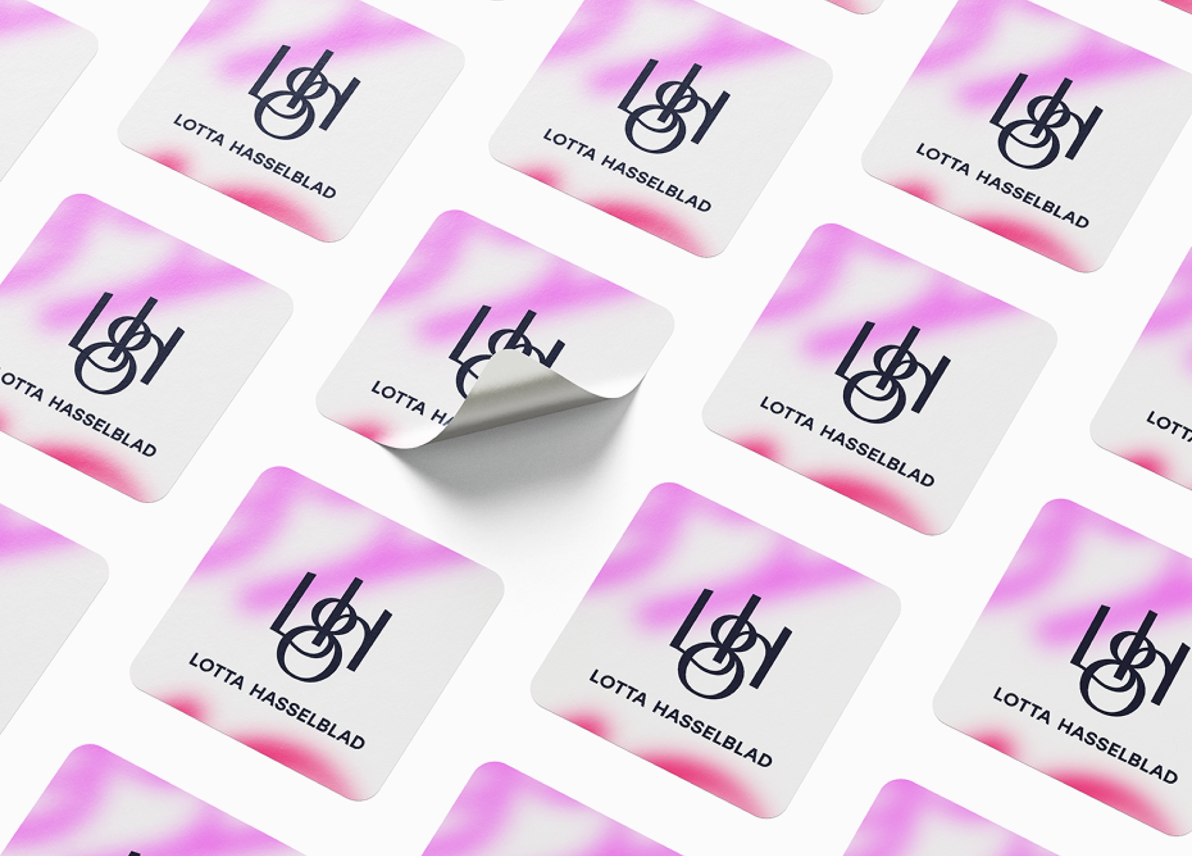Rows of square stickers with the Lotta Hasselblad logo on a pink gradient